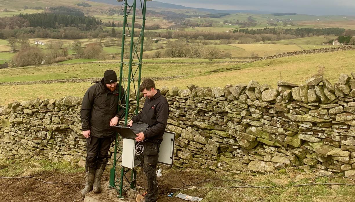 BROADBAND WORK: Alncom engineers Jamie Cracket and Oscar Gallon inspect the signal tower in upper Teesdale that is providing much faster broadband to properties that had almost no connectivity before