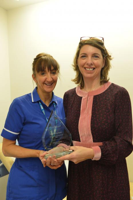 JOB WELL DONE: Barnard Castle Surgery senior advanced nurse practitioner Ruth Williams with Angels of the North Unsung Hero winner Vicky Bourne, left 	 TM pic