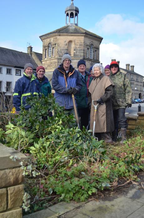 DIGGING IN: Ex-town councillor Roger Peat and Margaret Watson with volunteers as work starts at Amen Corner       TM pic