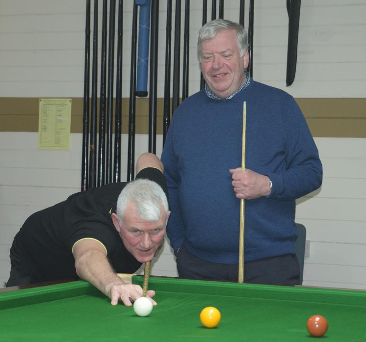 CLOSE RUN THING: Charles Blake lines up a shot watched by opponent David Dye as they contested the Ken Coats trophy