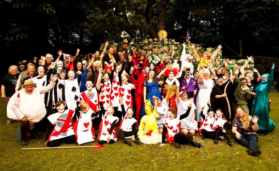 HAPPIER TIMES: The cast of Alice in Wonderland, which, in a break with tradition, was staged last summer