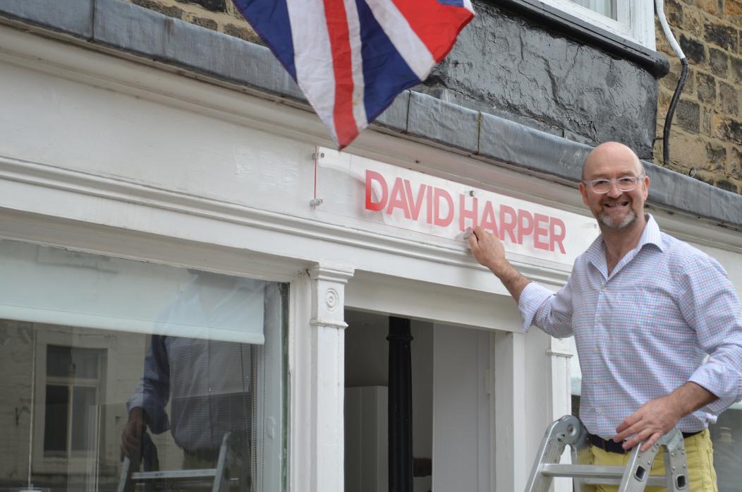 SIGN OF THE TIMES: David Harper announces his return to The Bank, in Barnard Castle, after an absence of five years