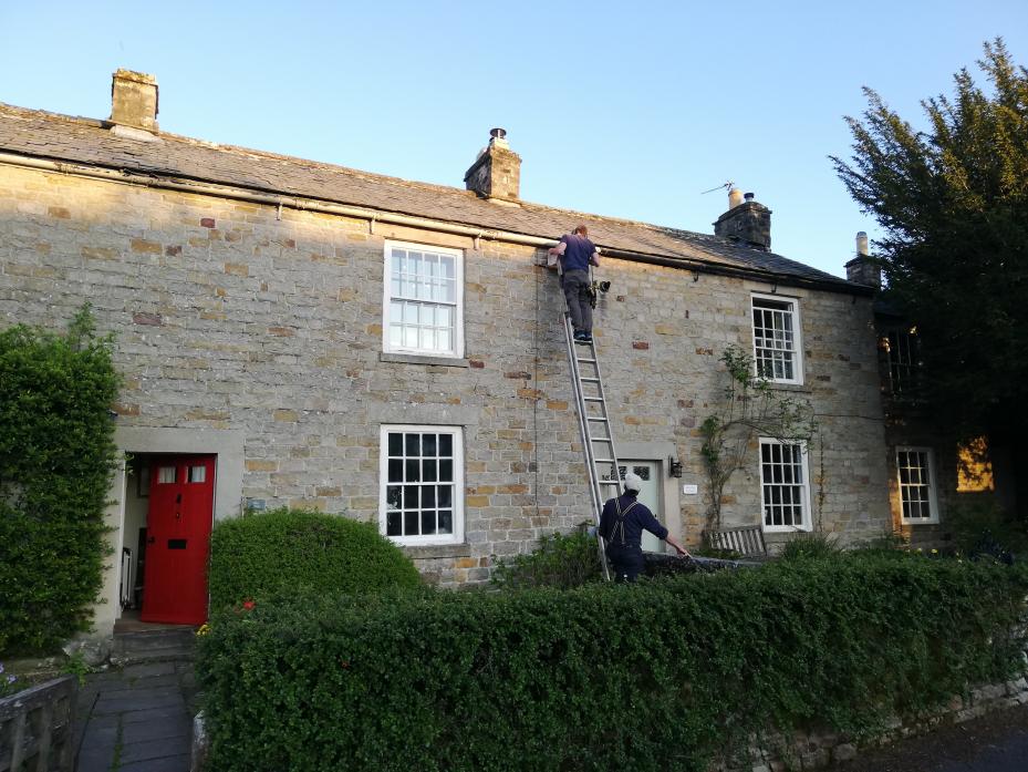 HOME FROM HOME: Richard Green and David Martin put up the bird boxes in Cotherstone