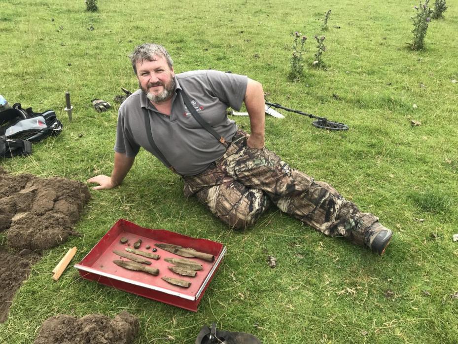 RARE FIND: Phillip Holt with a selection of items he discovered while metal-detecting on a farm near Eggleston