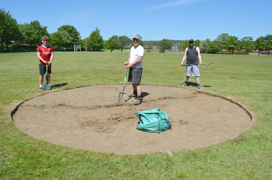 IF YOU BUILD IT: Peter Spencer, along with son Cameron, left, and Mike Hayman, create the home plate for the Durham Spartan’s new baseball diamond at Staindrop Academy