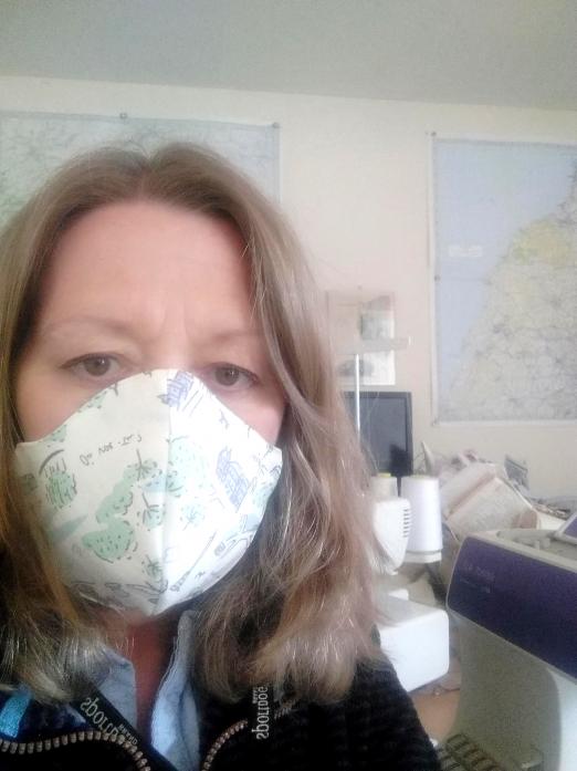 KEEPING BUSY: Textile artist Ann Gill has turned her hand to producing face masks, washbags, headbands and scrubs during the virus lockdown
