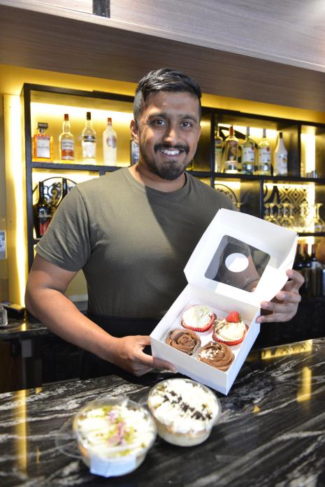 CURRY AND A CAKE Curry chef Naz Choudhury has found a new passion for baking cupcakes and milk-cakes 		             TM pic