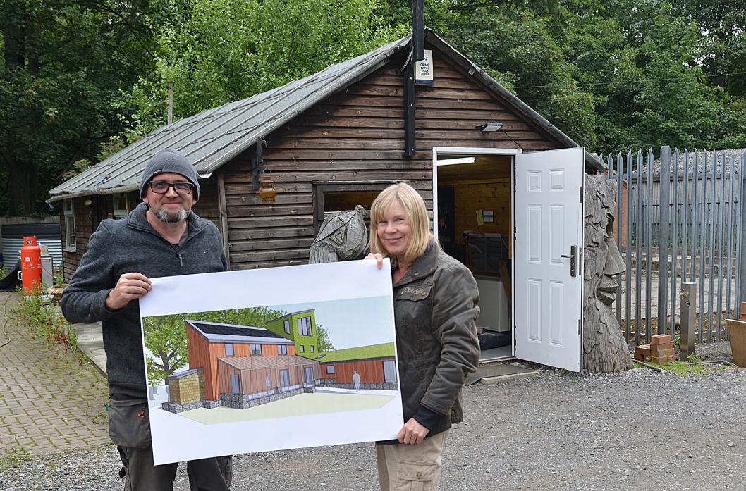 Martin and Jill Bacon with an architect's impression of what Rotters' new eco-centre will look like
