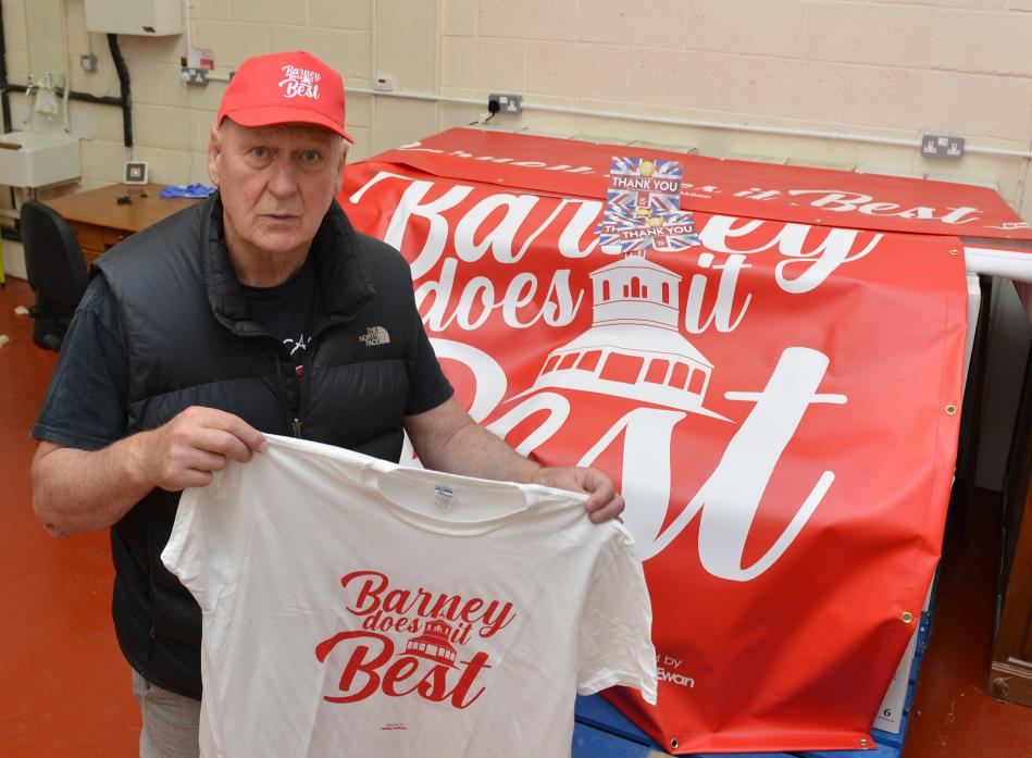 NEW CAMPAIGN: Peter Smith with some of the Barney Does It Best merchandise