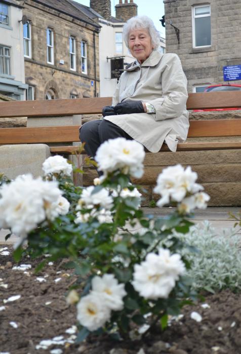 BLOOMING LOVELY: Margaret Watson is all smiles as the newly-planted white roses come into bloom at Amen Corner