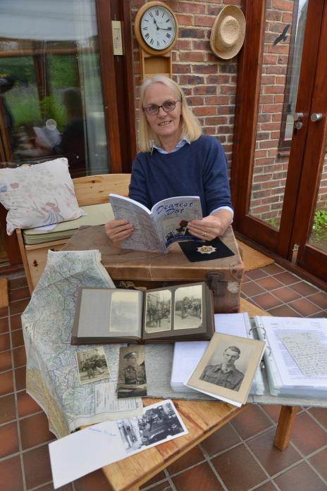 IN PRINT: Mary Stastny with some of the letters, photographs, cuttings and war memorabilia that her father Capt Geoffrey Gilbertson kept in an old case