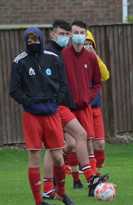 MEN IN THE MASKS: Under new regulations, Bowes FC’s substitutes must wear masks when they are on the touchline