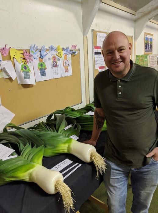 BEST IN SHOW: Brian Boucher with the pot leeks which were judged best in show