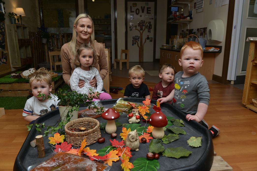 WELLBEING: Nursery manager Melanie Mitchell with a wanderlust group learning more about autumn