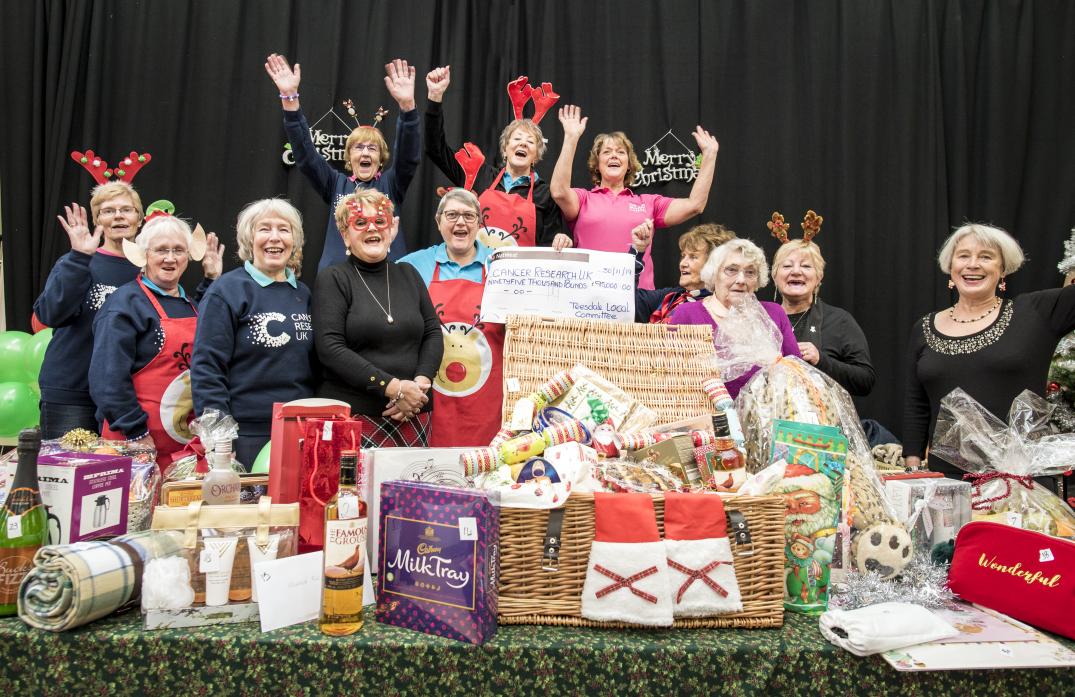 LOCAL HEROES: Members of the Teesdale Branch of Cancer Research UK at last year’s Christmas fair. Covid-19 means they can’t get together to pick up their award