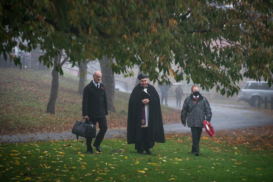HISTORIC EVENT: Father Ian Grieves, centre, arrives at the service on Gainford Village Green