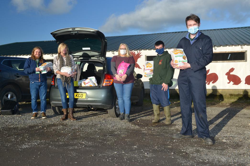TESTING TIMES: Sarah Barraclough and her son Jay Wakefield get help from Wetheriggs staff and volunteers Lorna Park, Steven Mounter and Oliver Allinson to unload a boot load of animal feed donated by a Darlington pet shop