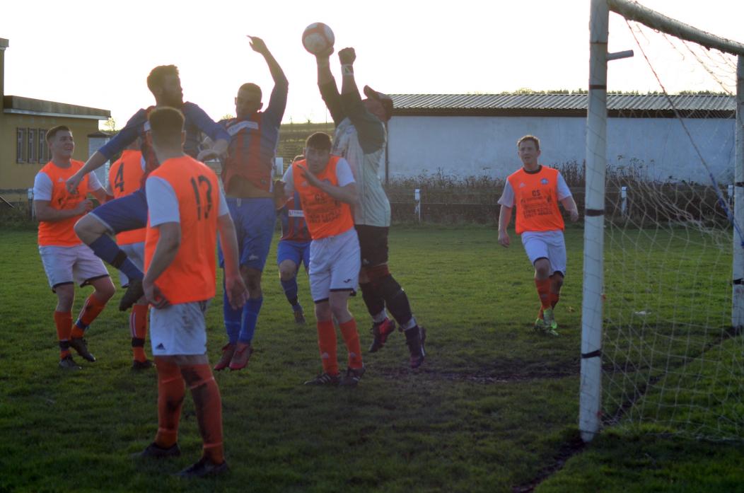 HANDS OFF: Evenwood keeper Mark Tyrie punches a cross away