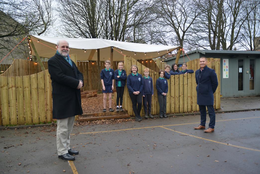 TIME FOR REFLECTION: Vicar Revd Ken Steventon, headteacher Steve Whelerton and Staindrop Primary School’s ambassadors ahead of the blessing their new reflection area