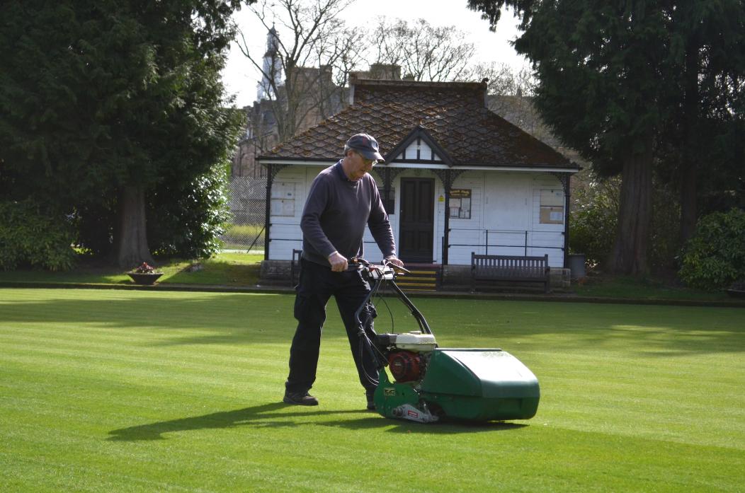 A CUT ABOVE: Angus Dowson was giving the green at Barnard Castle Bowls Club its first cut of the year last week in preparation for the resumption of action