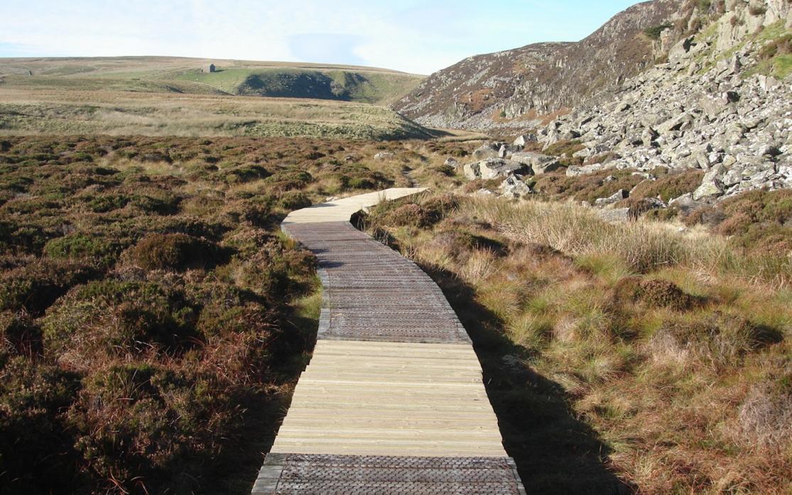 ISOLATED REPAIRS: Material had to be flown in by helicopter, picture below, so repairs to the boardwalk at Falcon Clints, on the Pennine Way, could take place