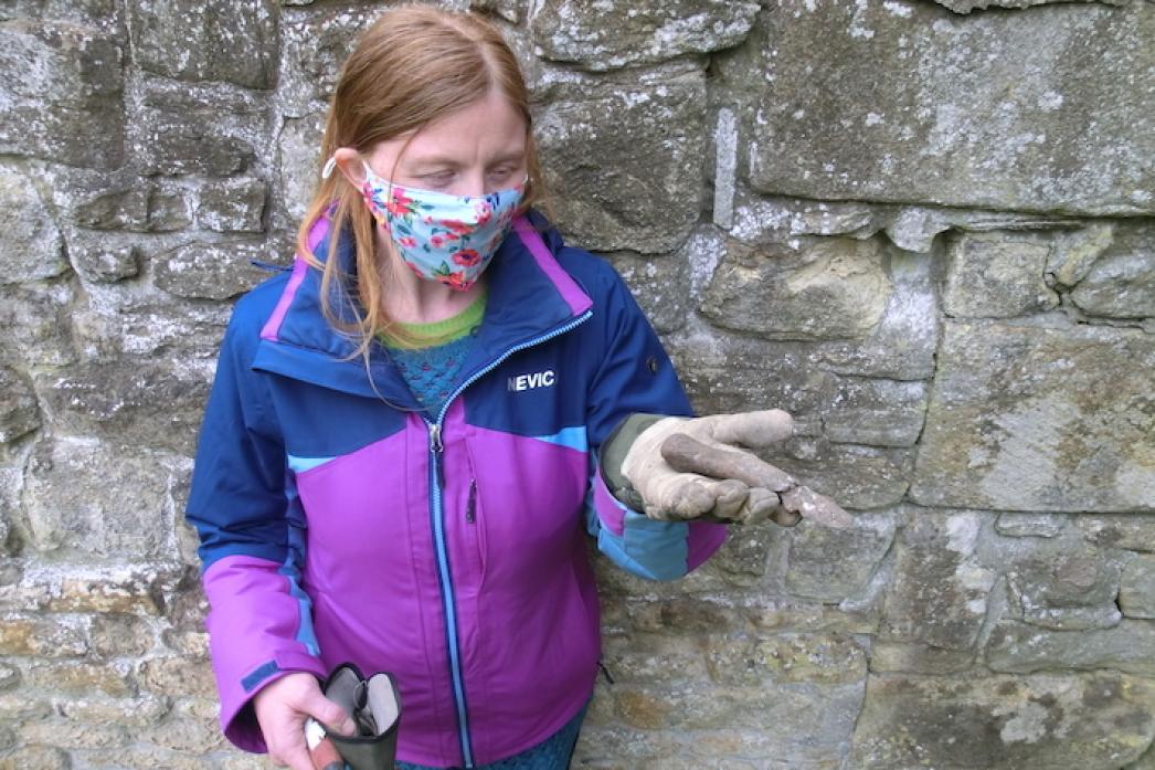 ARTEFACT: Archaeologist Leanne Gray with the bone handled knife uncovered at the dig