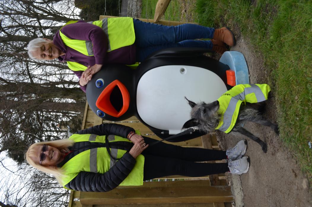 LITTER BIN: Middleton in Bloom volunteers Jo Lee and Pam Phillips with mascot Maisie and the newly installed litter bin