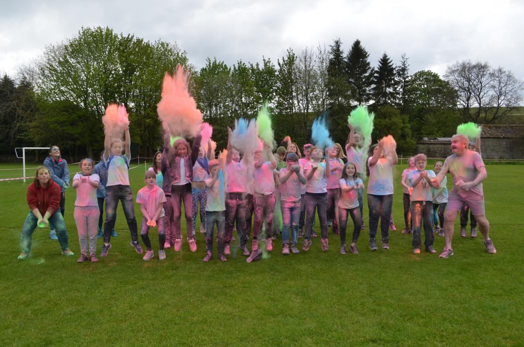 FUN AT SCHOOL: Year five and six pupils completed their half-hour run with a colour jump