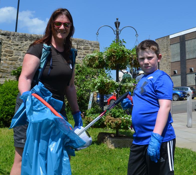 PICK IT UP: Julia Steele and nine-year-old son Matthew prepare for the litter pick