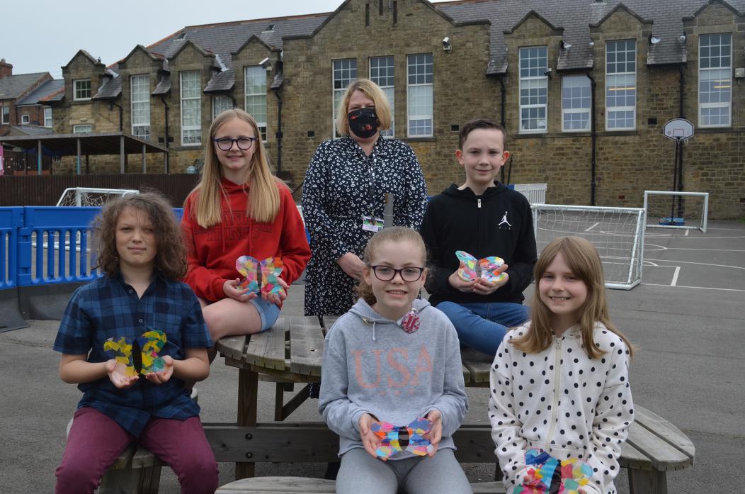 SO PROUD: Cockfield School head teacher Kathryn Costello with pupils Connie Beadle, Oliver Horley, William Hebdon, Ellie Bennett and Isla-Clem Murphy, who masterminded an activity day to raise cash and awareness for the Alzheimer’s Society