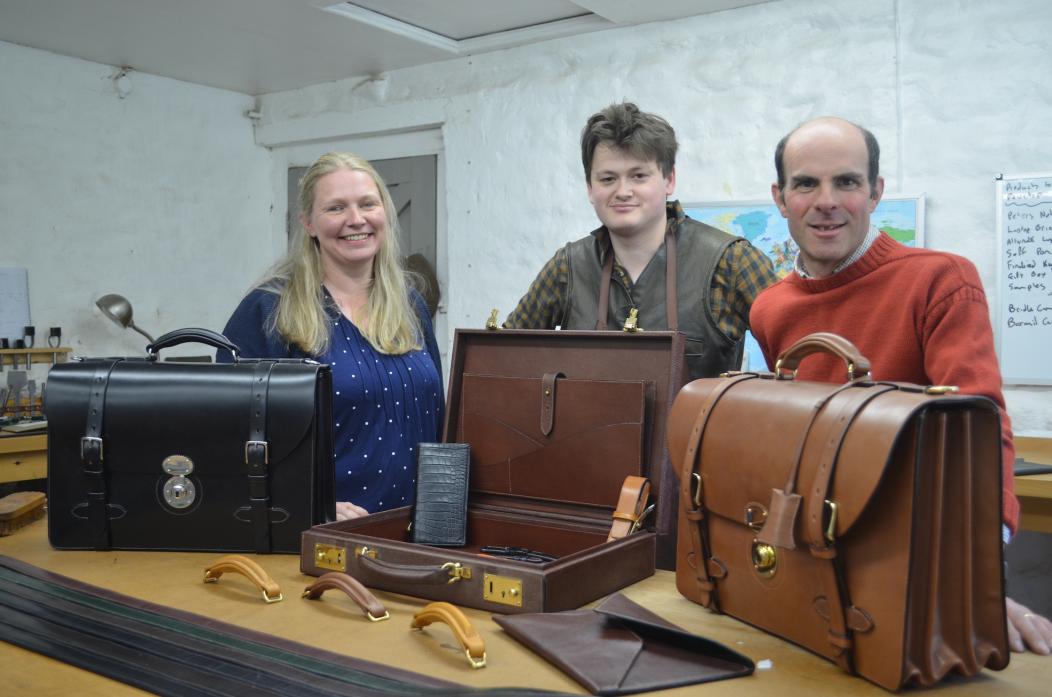 SURGE IN DEMAND: Equus Leather – Dawn and Charlie Trevor with leather worker Rob Ford – are planning to take on an apprentice