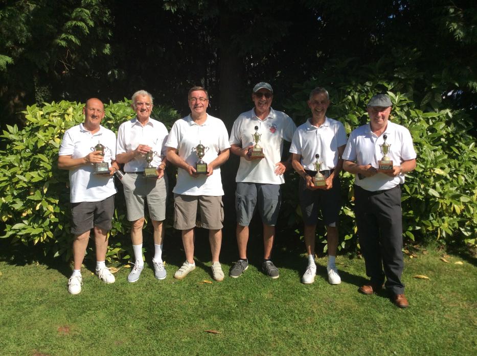 HEATED BATTLE: Dennis Richards, Tony Barkshire, Kevin Cross, Angus Dowson, Brian Smurthwaite and Tony Hudspeth braved the heat to be winners and runners-up in the club trips tournament.