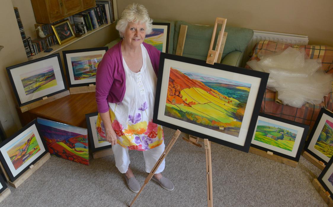 EXHIBITION: Angie Townsend with a painting called A cracking view, which features a scene in upper Swaledale