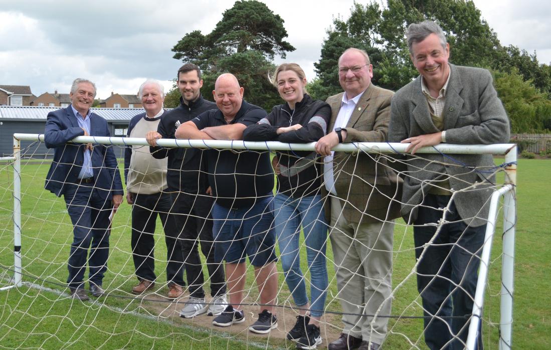 HELPING TO ACHIEVE CLUB’S GOAL: From left, Cllr James Rowlands, Cllr George Richardson, Jimmy Raine and Geoff Thwaites from Bowes FC, MP Dehenna Davison, Cllr Ted Henderson and Cllr Richard Bell