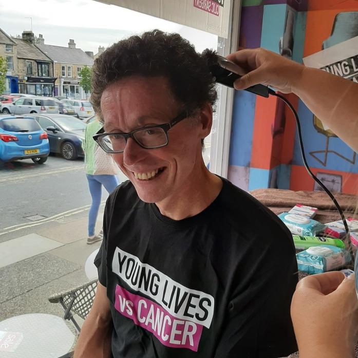 CANCER HELP: Paul Olivier gets his head shaved
