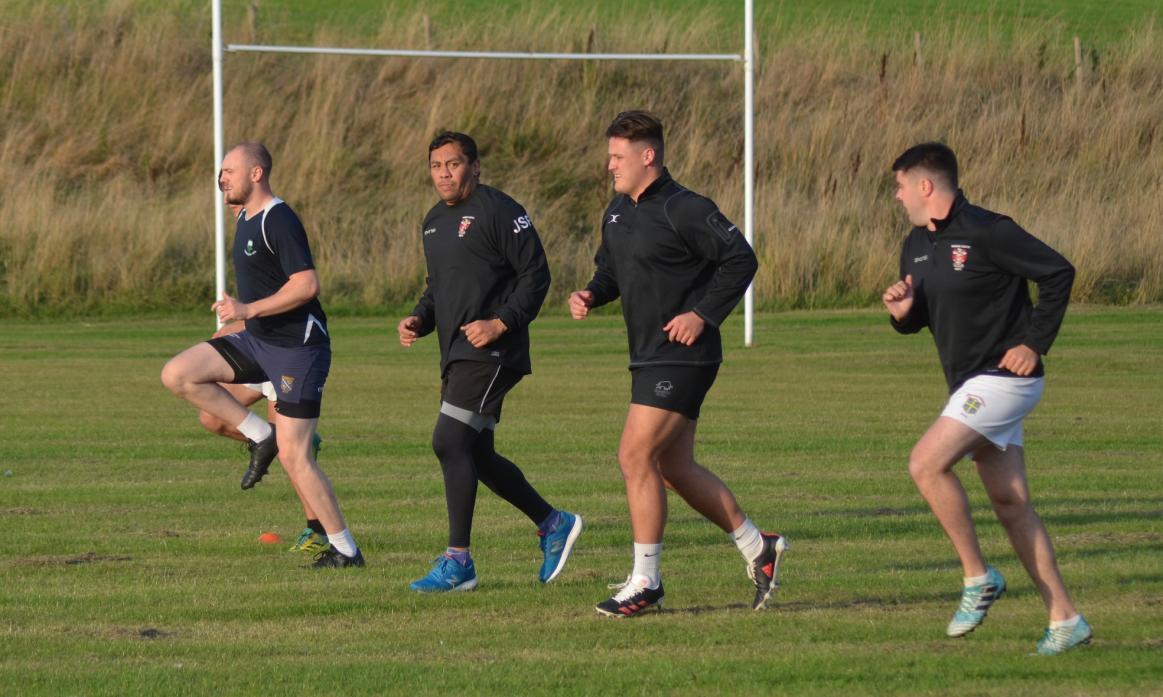 BEST FOOT FORWARD: Coach Junior, second left, puts his squad through their paces as they prepare for the start of the new season at home to Sedgefield on Saturday
