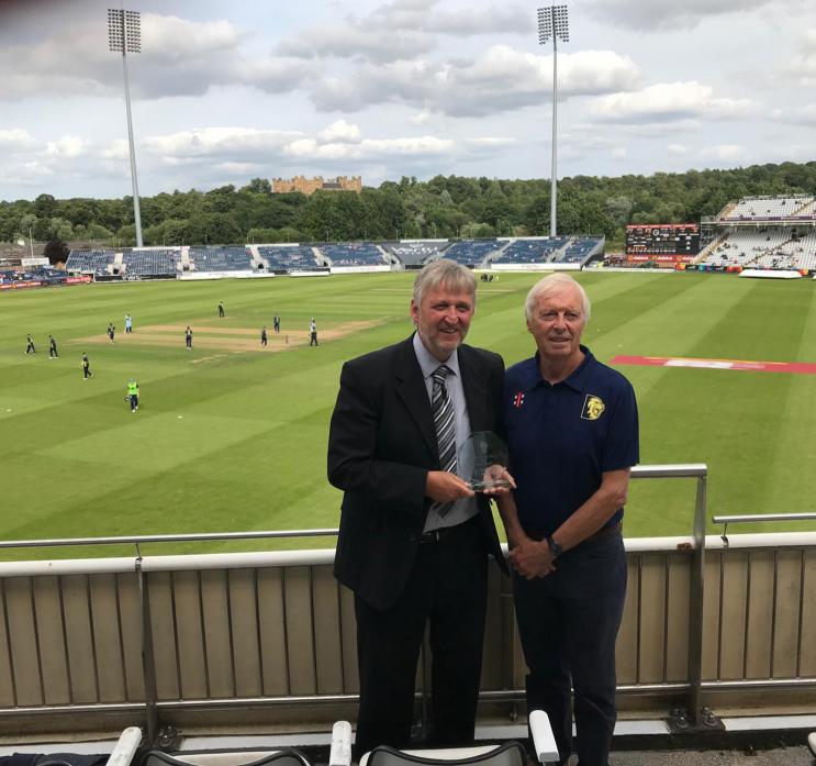 TOP AWARD: Raby Castle CC’s Steve Caygill receives his coaching award from Durham Cricket’s Gary Hulme