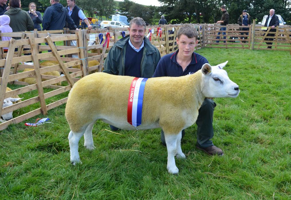 NICE SURPRISE: Jeffrey Teward and son Stephen show the champion sheep at this year’s Bowes Show, a gimmer shearling