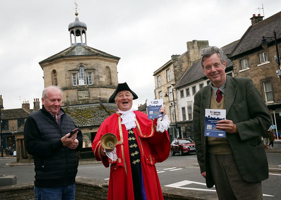 OLD MEETS NEW:  Martin Clark, Barnard Castle Town Council clerk, county councillor Richard Bell, and town crier Ian Kirkbride and at the official launch of the project