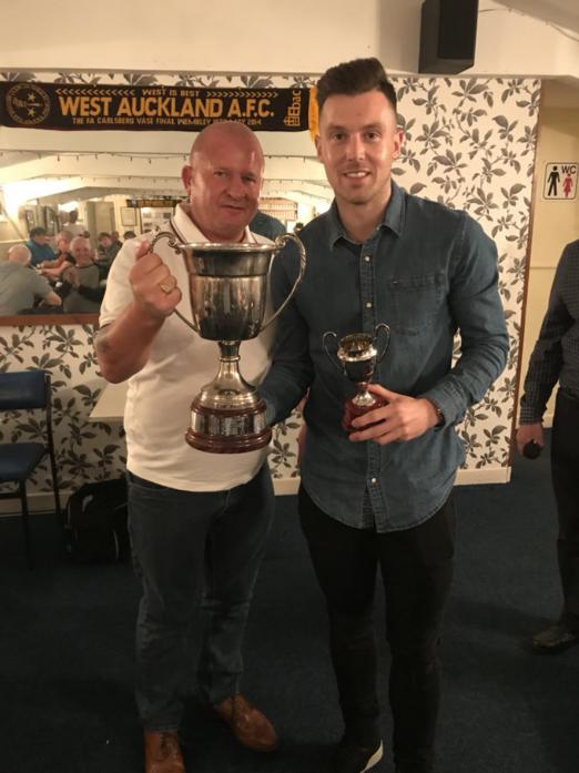 GREAT SEASON: Nathan Fisher receives the player of the year award from shirt sponsor Jeff Dobson, of Dobson’s Marquee Hire