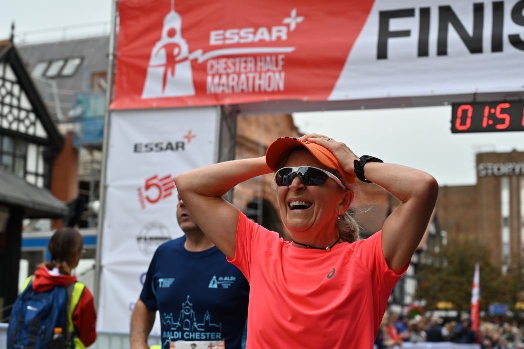EXHAUSTED HAPPINESS: Claire Hesketh will represent England in the British Masters Half Marathon Championships  after finishing the Chaster Half Marathonb in one hour and 50 minutes