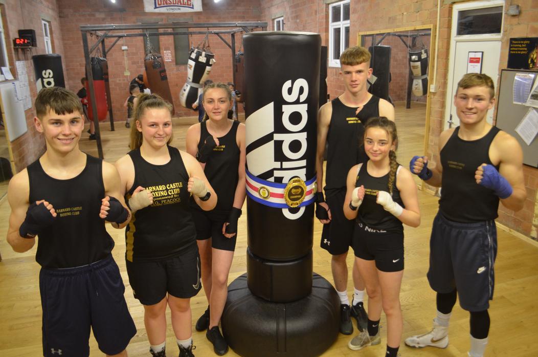 PACKING A PUNCH: Dan Jackson, Brianna, Sinead and Paige Fielden with George Peacock and Nathan Forrest who competed at the weekend from Barnard Castle Boxing Club
