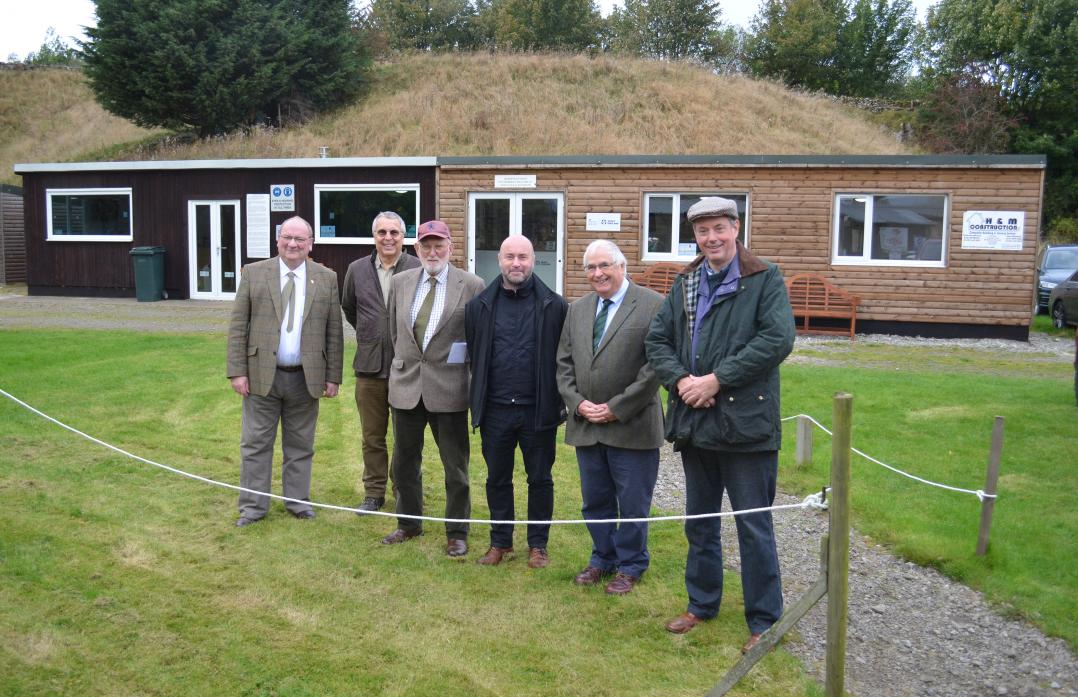 NEW LOOK: Unveiling the clubhouse extension are, from left, Cllr Ted Henderson, Teesdale Gun Club secretary Tony Brittain, club treasurer Ted McFarlane, Sport England investment manager Alan Dovaston, gun club vice-president Christopher Oughtred and Cllr