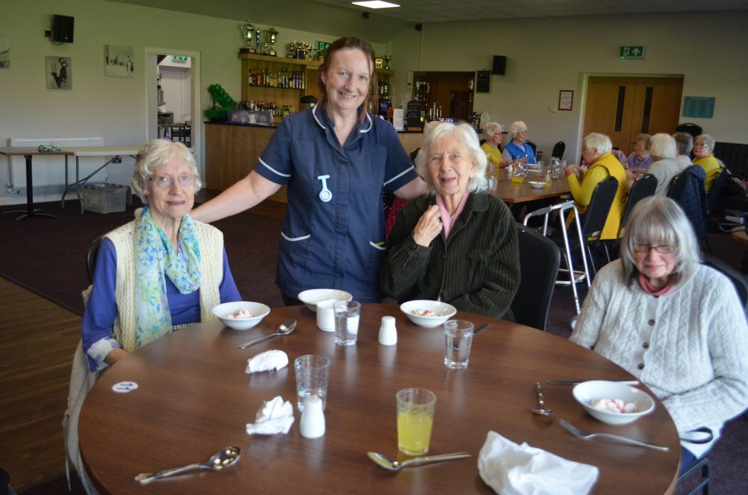 WE'RE BACK: Carer Debbie Leck with members of the Barnard Castle lunch club
