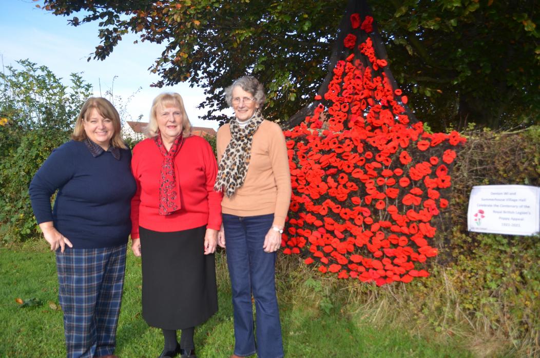 RED FOR REMEMBRANCE: Denton WI members Diane McKay, Nancy James and Judith Hodgson, president, with the beautifully crafted poppy display at Summerhouse village hall