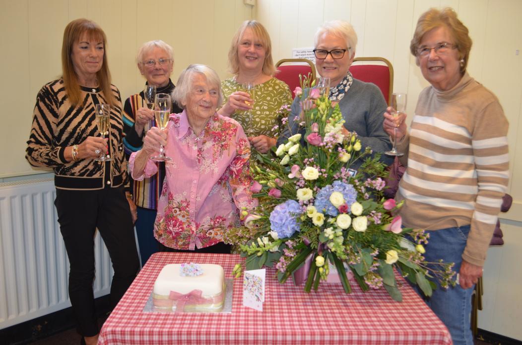 MANY HAPPY RETURNS: There were pre-birthday drinks at Winston Lunch Club for Joyce White pictured, with some of the group’s volunteers