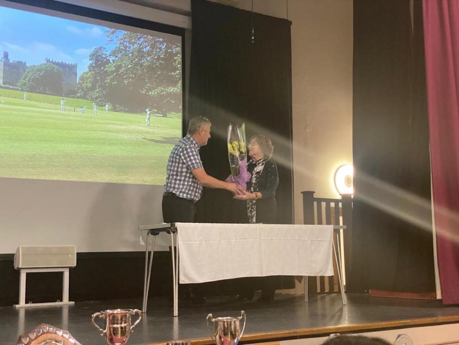 THANK-YOU: Raby Castle CC secretary Steve Caygill presents Betty Poole with a bouquet of flowers to thank her for her service as the club’s treasurer