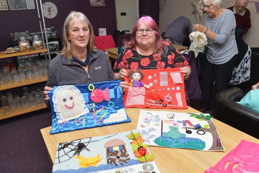 HELP FOR DEMENTIA: Lesley Taylor and Theresa Atkinson with some of the fiddle mats made by their group