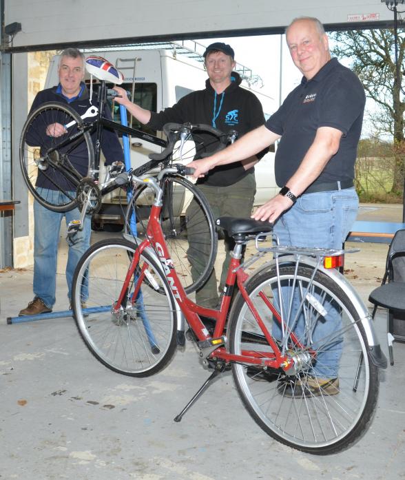 GEARING UP: Paddy Muir, of Swale Cycles, centre, with Andrew Mounter, left, and Richard Witham at the community connector session