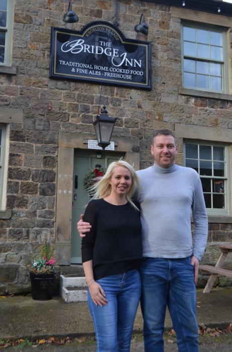 BACK IN BUSINESS: Mike and Tracey Pearson reopened The Bridge Inn at Whorlton in time for the lights switch-on